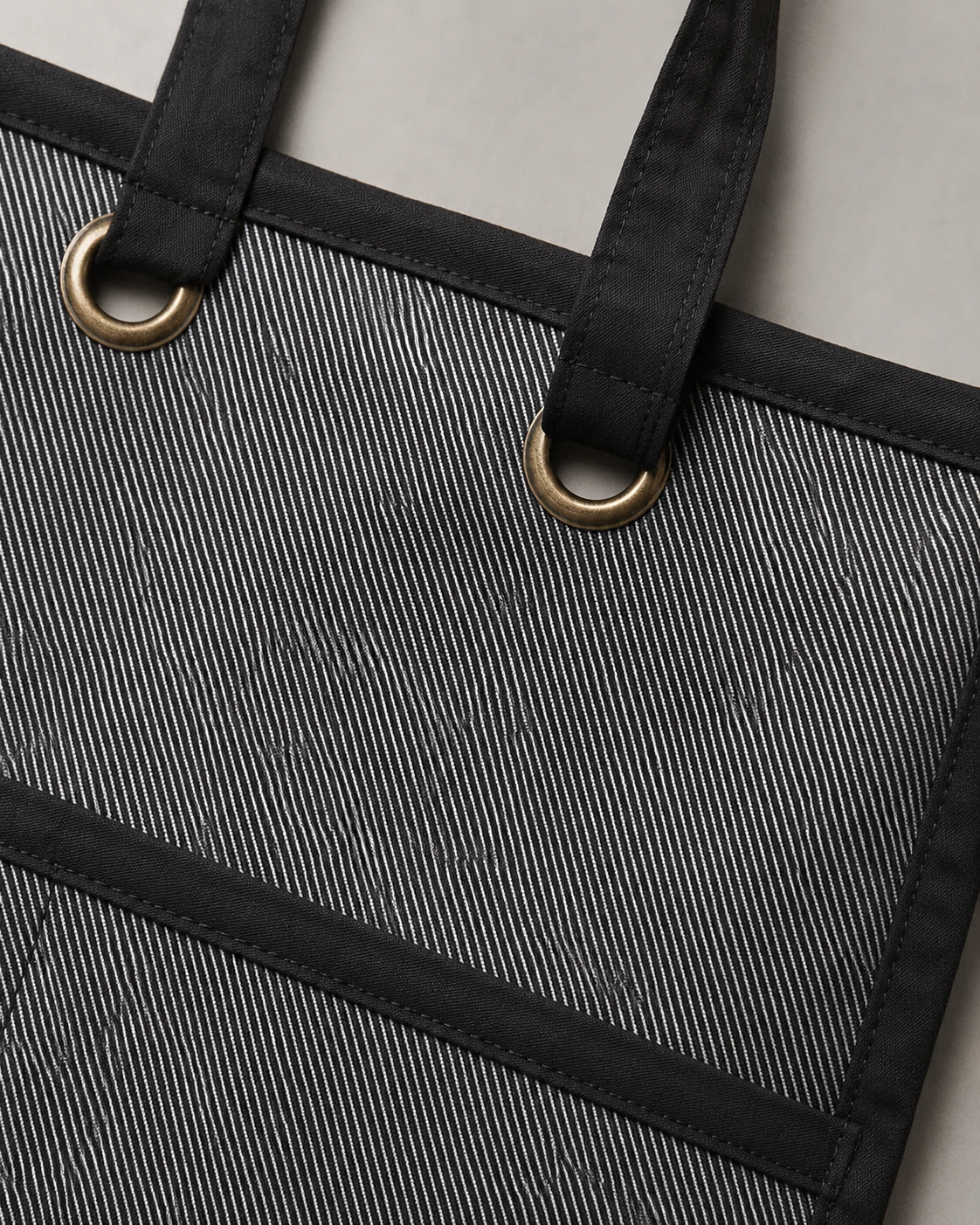 Actual apron fabric and hardware detail